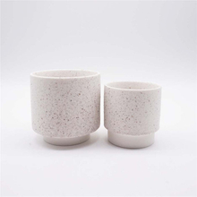 White ceramic candle cup